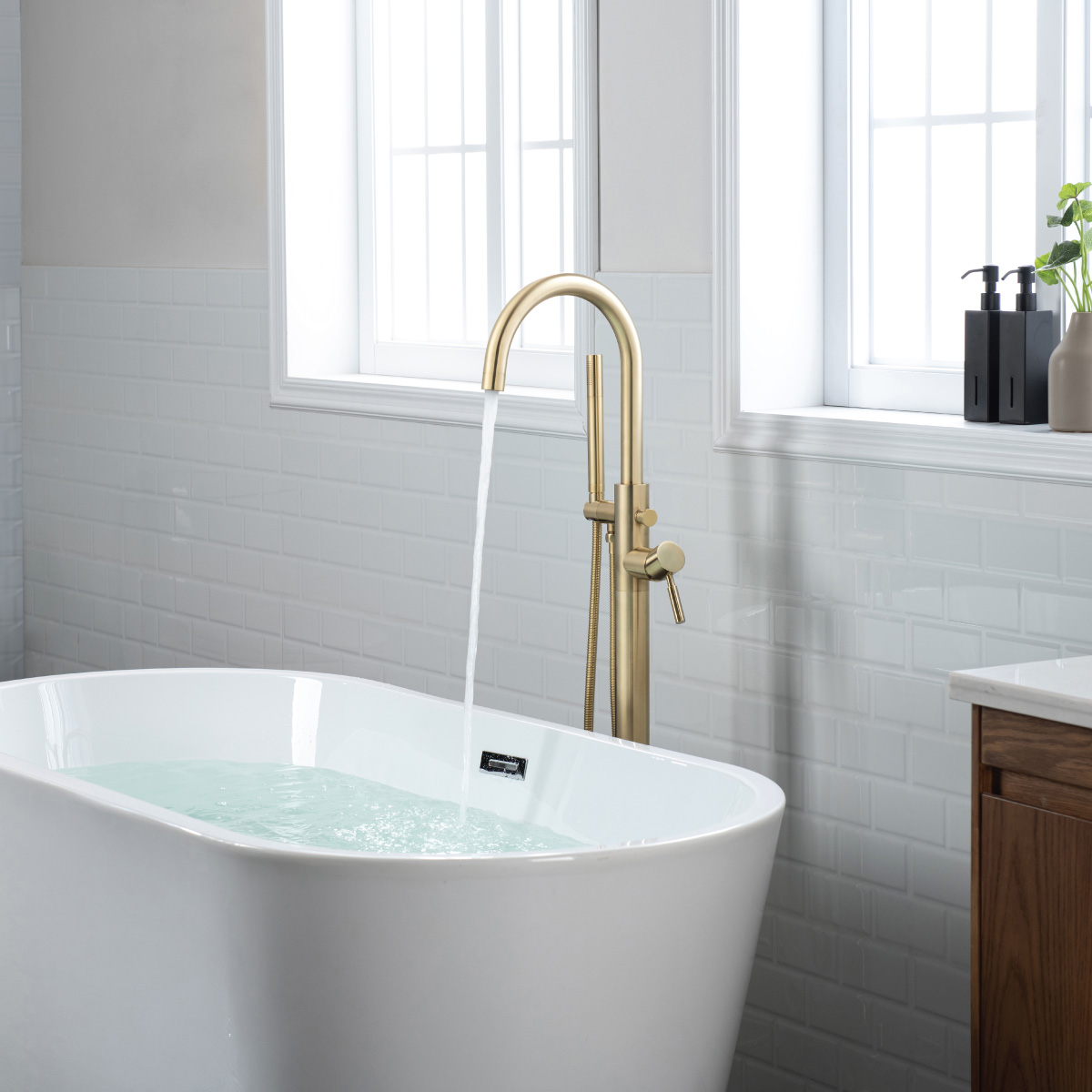 floor mount faucet in satin brass finish