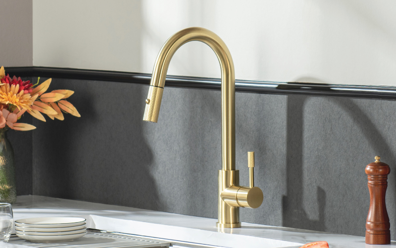 brushed gold faucet with knirling