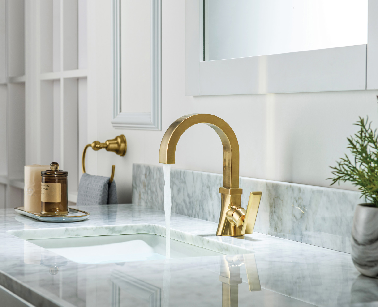 chrome shower set on white marble