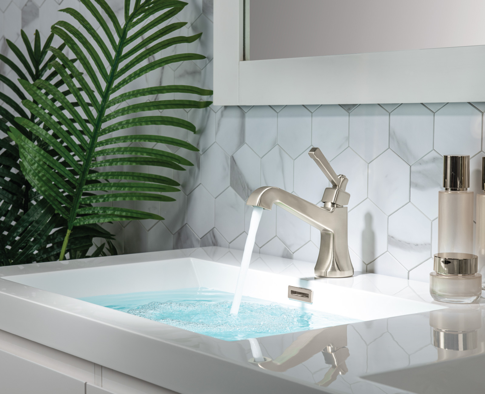chrome shower set on white marble